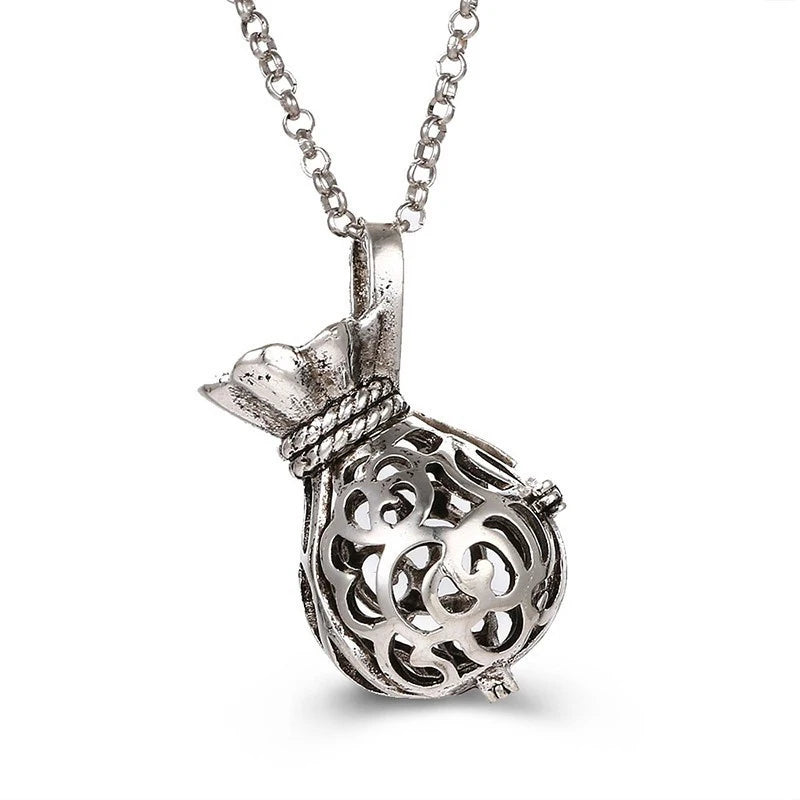 2020 beliebte Multi-Stile hohle Vintage-Halskette Schmuck Musik Ball Schwangerschaft Glocke Halskette Aroma ätherisches Öl Medaillon Anhänger