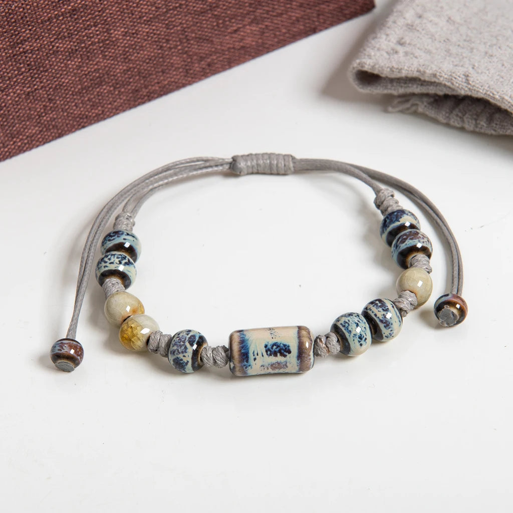 Handgefertigtes blaues Muster-Keramikarmband mit Röhrenperle, verstellbares Seil, Vintage-Schmuck im ethnischen Stil S03-115