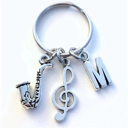 Persönlichkeit Saxophon Schlüsselanhänger Saxophonist Schlüsselanhänger Geschenk für Jazz Musiker Schlüsselanhänger Sax Geschenk Violinschlüssel Initiale Musik Charms
