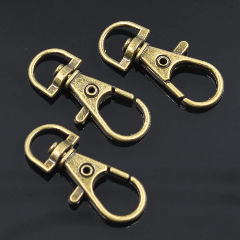 10 Stück Großhandel Silber Farbe Rhodium Karabinerverschluss Clips Schlüsselhaken Schlüsselanhänger Split Schlüsselanhänger Erkenntnisse Verschlüsse DIY Schlüsselanhänger Herstellung
