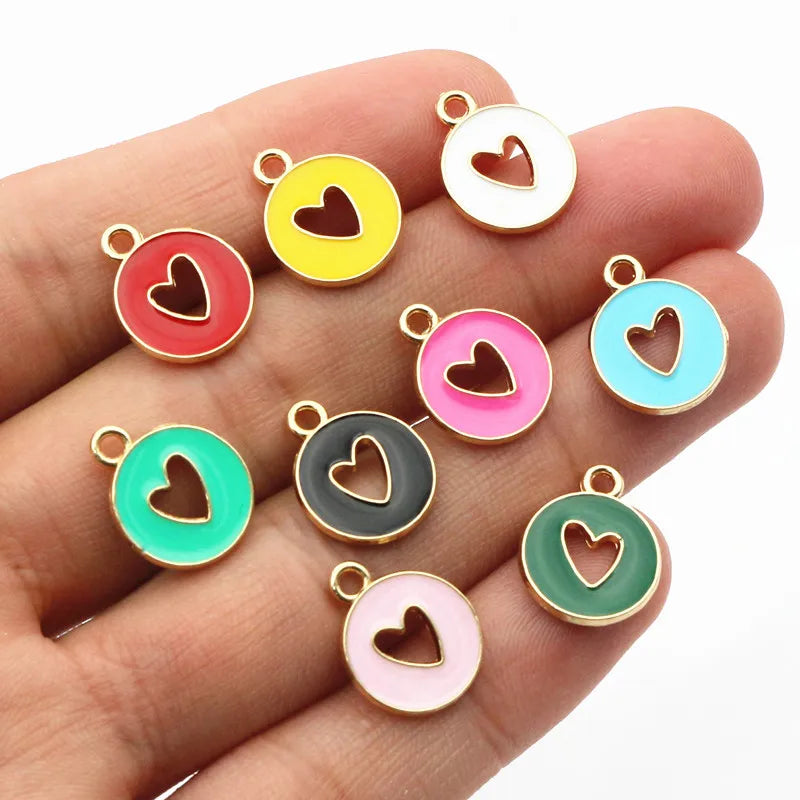 20 Stück 15 x 12 mm Emaille doppelseitig hohle Herz Charms Anhänger DIY Schmuckherstellung Zubehör für Armband Ohrringe Halskette
