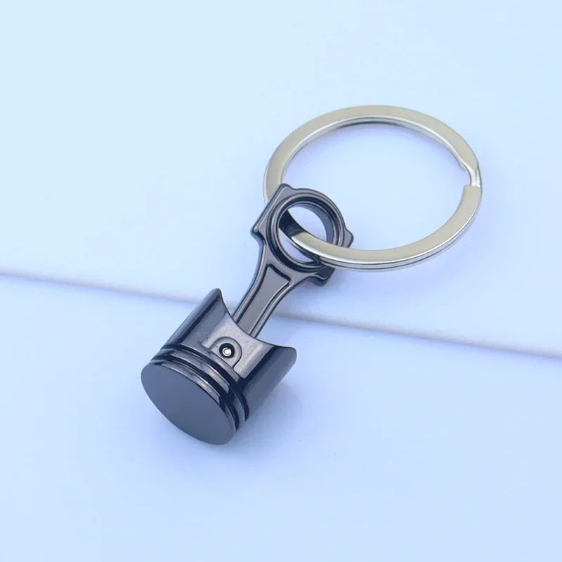 Mini Zink-legierung Auto Teile Schlüsselanhänger Simulierte Geschwindigkeit Getriebe Absorber Motor Kolben Anhänger Auto Schlüssel Halter Schlüsselring Nette Männer Geschenk