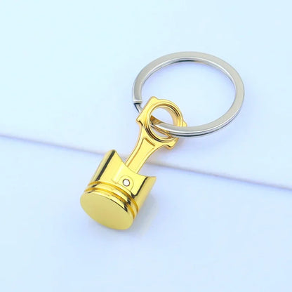 Mini Zink-legierung Auto Teile Schlüsselanhänger Simulierte Geschwindigkeit Getriebe Absorber Motor Kolben Anhänger Auto Schlüssel Halter Schlüsselring Nette Männer Geschenk
