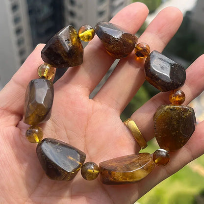 2026 Echtes Bernstein-Armband für Geburtstagsfeiern Einzigartiges Handgefertigtes Baltisches Pflanzen-DIY Facettierte Perlen 100% Echtes Naturstein-Schmuckstück