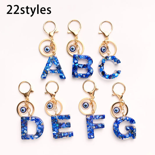 Neuer königsblauer Schlüsselanhänger mit 26 englischen Buchstaben, Devil's Eye, Taschenanhänger für Damen mit Großbuchstaben