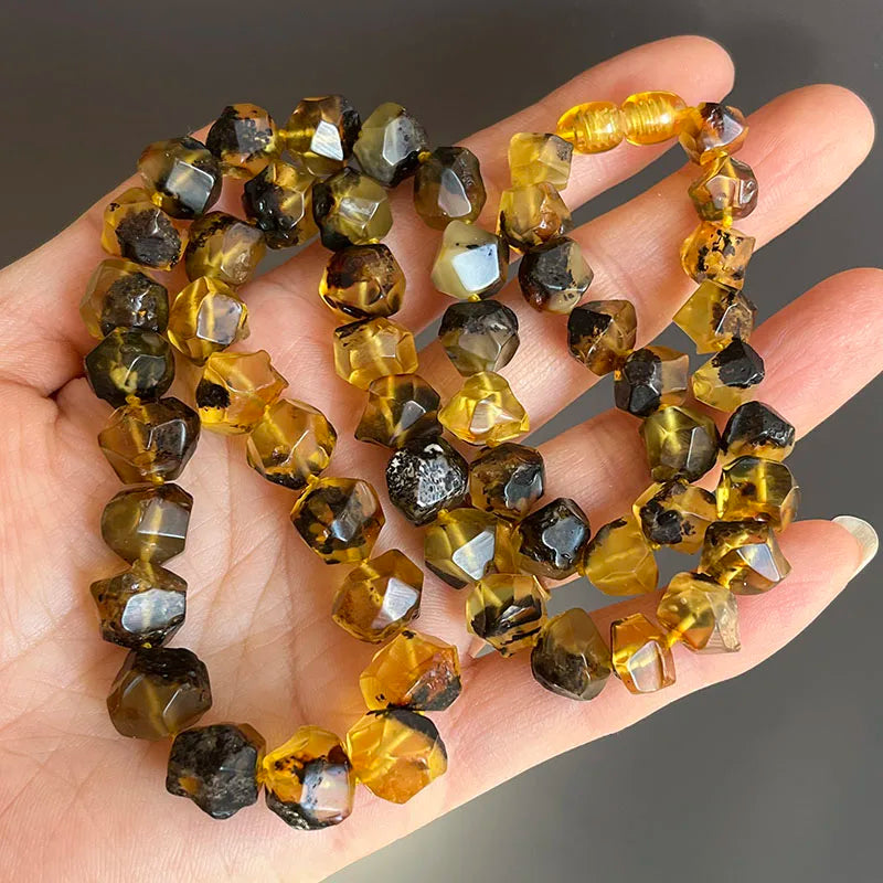 Natürliche Bernstein-Armbänder als Geschenk, einzigartige coole schwarze Perlen, original medizinischer Spezialstein, 2026, neuer Diy-Heilschmuck im Großhandel