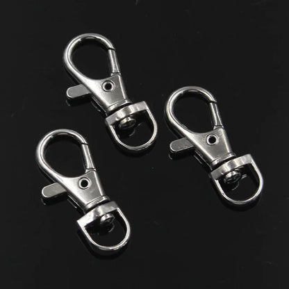 10 Stück Großhandel Silber Farbe Rhodium Karabinerverschluss Clips Schlüsselhaken Schlüsselanhänger Split Schlüsselanhänger Erkenntnisse Verschlüsse DIY Schlüsselanhänger Herstellung