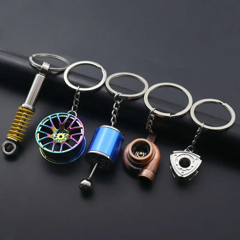 Mini Zink-legierung Auto Teile Schlüsselanhänger Simulierte Geschwindigkeit Getriebe Absorber Motor Kolben Anhänger Auto Schlüssel Halter Schlüsselring Nette Männer Geschenk