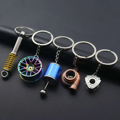 Mini Zink-legierung Auto Teile Schlüsselanhänger Simulierte Geschwindigkeit Getriebe Absorber Motor Kolben Anhänger Auto Schlüssel Halter Schlüsselring Nette Männer Geschenk