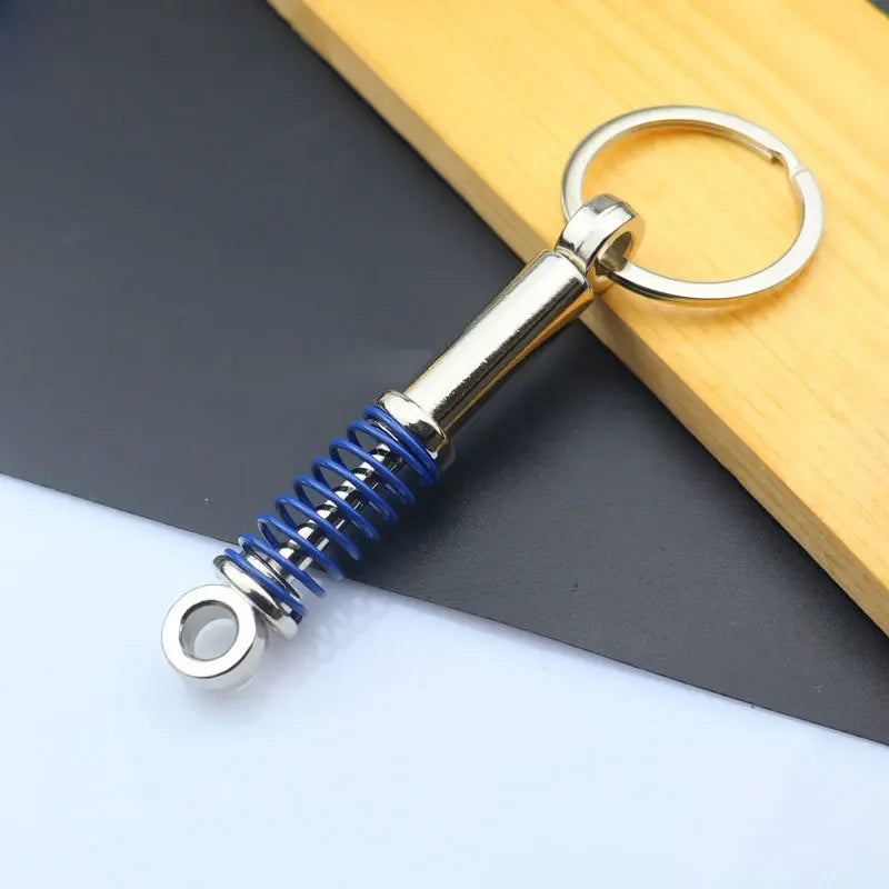 Mini Zink-legierung Auto Teile Schlüsselanhänger Simulierte Geschwindigkeit Getriebe Absorber Motor Kolben Anhänger Auto Schlüssel Halter Schlüsselring Nette Männer Geschenk