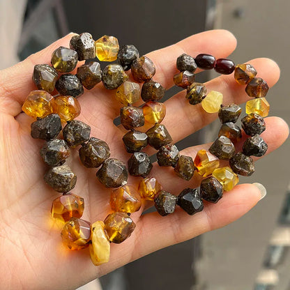 Natürliche Bernstein-Armbänder als Geschenk, einzigartige coole schwarze Perlen, original medizinischer Spezialstein, 2026, neuer Diy-Heilschmuck im Großhandel