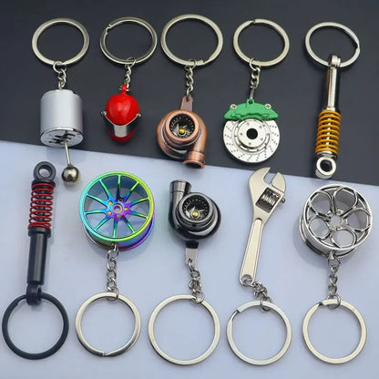 Mini Zink-legierung Auto Teile Schlüsselanhänger Simulierte Geschwindigkeit Getriebe Absorber Motor Kolben Anhänger Auto Schlüssel Halter Schlüsselring Nette Männer Geschenk