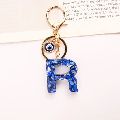 Neuer königsblauer Schlüsselanhänger mit 26 englischen Buchstaben, Devil's Eye, Taschenanhänger für Damen mit Großbuchstaben