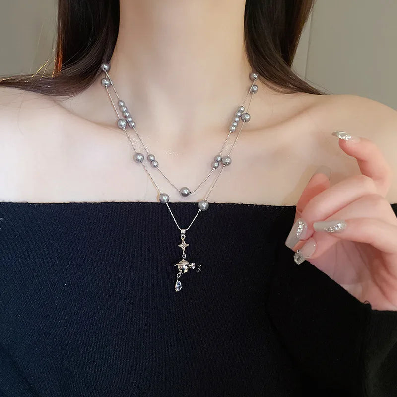 Mit Diamanten besetzte Saturn-Wassertropfen-Perlenkette, französische, leichte, luxuriöse Premium-Pulloverkette, vielseitiges Weihnachts- und Geburtstagsgeschenk