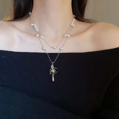 Mit Diamanten besetzte Saturn-Wassertropfen-Perlenkette, französische, leichte, luxuriöse Premium-Pulloverkette, vielseitiges Weihnachts- und Geburtstagsgeschenk