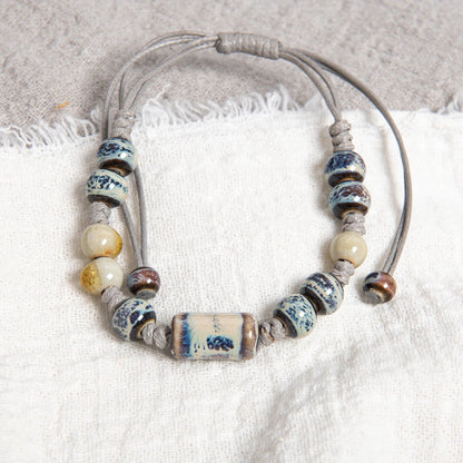 Handgefertigtes blaues Muster-Keramikarmband mit Röhrenperle, verstellbares Seil, Vintage-Schmuck im ethnischen Stil S03-115