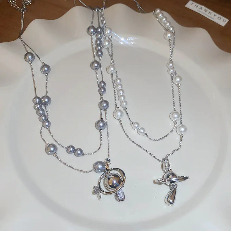 Mit Diamanten besetzte Saturn-Wassertropfen-Perlenkette, französische, leichte, luxuriöse Premium-Pulloverkette, vielseitiges Weihnachts- und Geburtstagsgeschenk