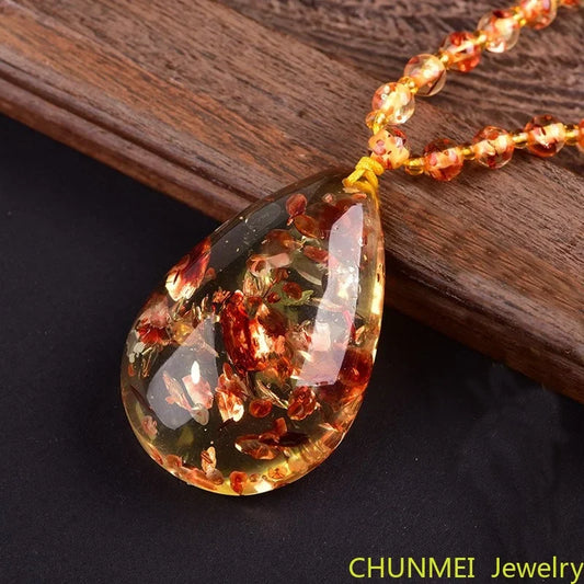 Fragmentierte Blume Tropfen Anhänger Pullover Kette Bienenwachs Bernstein Original Stein Regenbogen Kette Halskette für Männer und Frauen Bernstein Anhänger