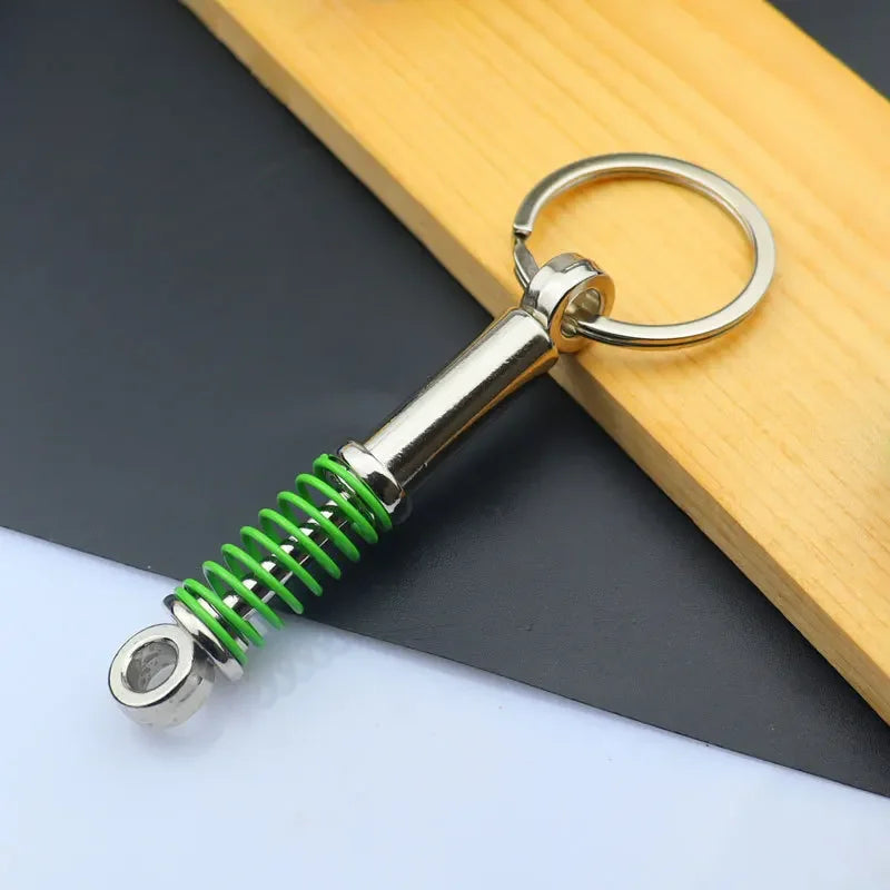 Mini Zink-legierung Auto Teile Schlüsselanhänger Simulierte Geschwindigkeit Getriebe Absorber Motor Kolben Anhänger Auto Schlüssel Halter Schlüsselring Nette Männer Geschenk