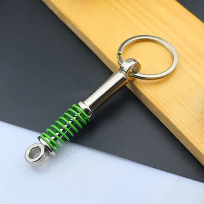 Mini Zink-legierung Auto Teile Schlüsselanhänger Simulierte Geschwindigkeit Getriebe Absorber Motor Kolben Anhänger Auto Schlüssel Halter Schlüsselring Nette Männer Geschenk