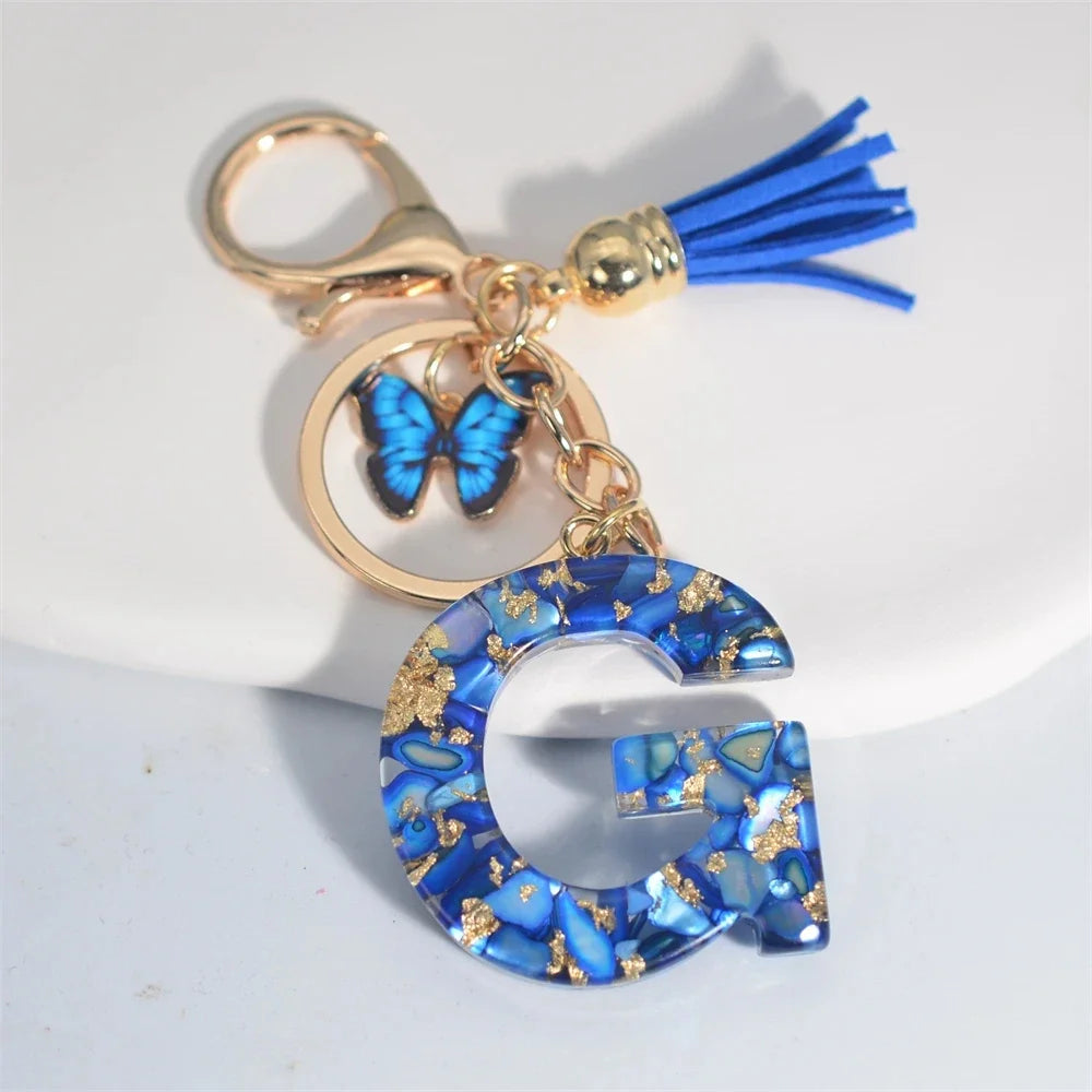 Modischer blauer glasierter Stein, A bis Z, Buchstaben-Schlüsselanhänger, 26 Initialen, Alphabet, Schmetterling, Quaste, Anhänger, Auto-Schlüsselanhänger, Damenschmuck, Geschenke