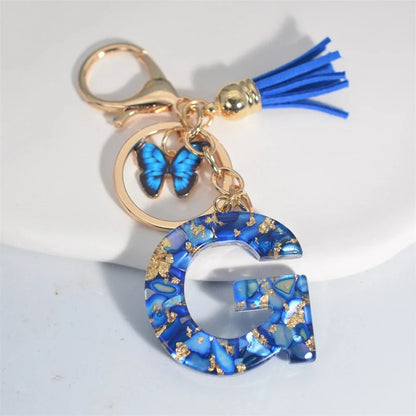 Modischer blauer glasierter Stein, A bis Z, Buchstaben-Schlüsselanhänger, 26 Initialen, Alphabet, Schmetterling, Quaste, Anhänger, Auto-Schlüsselanhänger, Damenschmuck, Geschenke